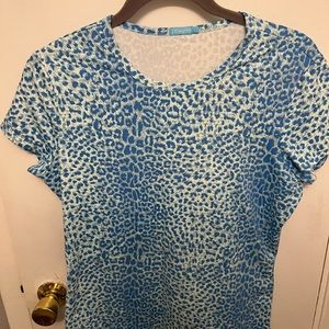 Nice top to wear with Jeans or skirts! Cool material!
